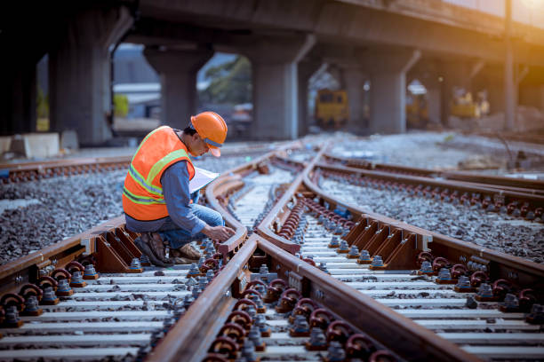 What vehicles must stop at all railroad crossings?